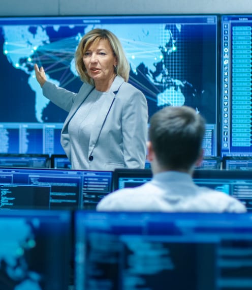 Woman leading security briefing for government agency