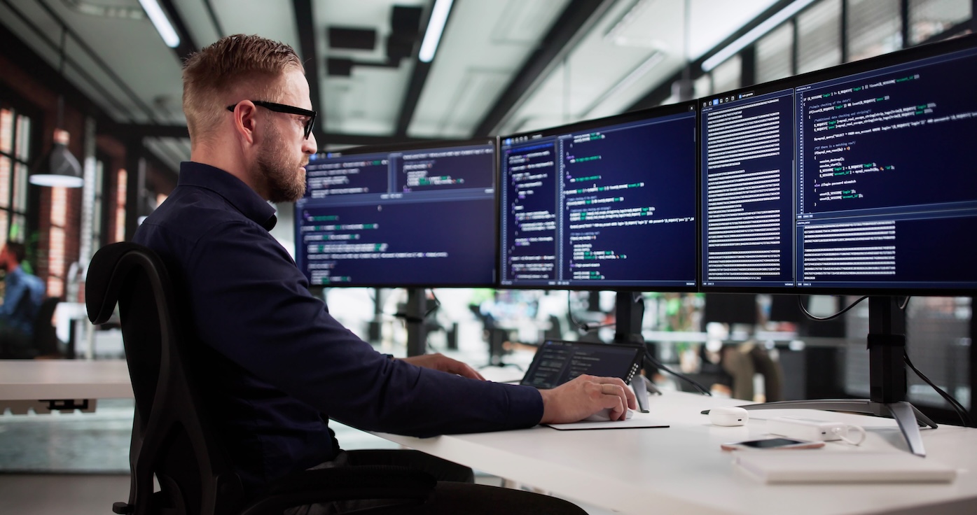 Digital Transformation Specialist Working On Coding Language At Office Computer